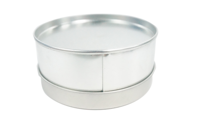the base of round tea tin with