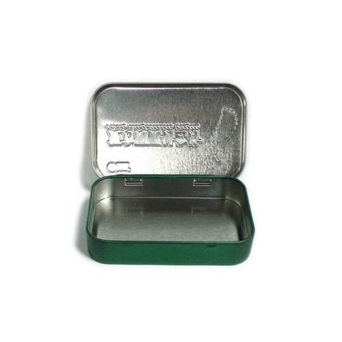 small embossed tin box with hinged lid