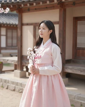 Korean woman wearing modern hanbok-inspired dress reflecting traditional cultural values